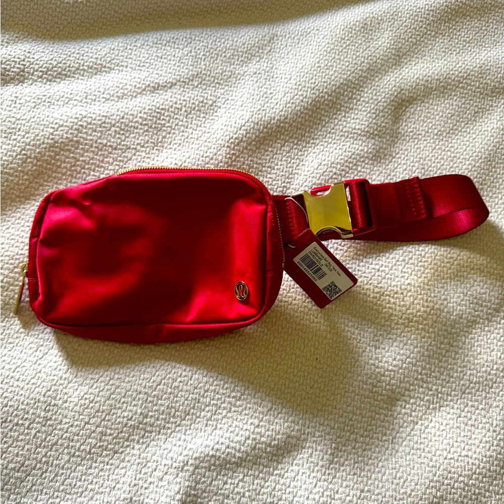 lululemon Everywhere Belt Bag Dark Red with Gold Buckle. Limited Edition
